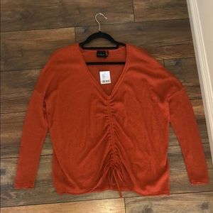 Adorable orange sweater